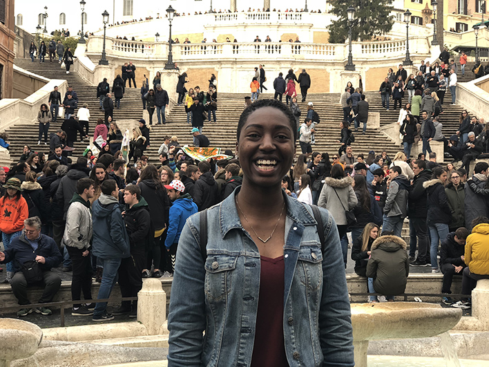 Gabrielle Jackson in front of a crowded plaza